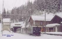 Ge 4/4 I 607 mit Reisezug verl��t den Albula-Tunnel, l�nge 5865 m, durch das Nordportal bei Preda - M�rz 1979