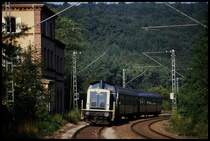 Am 15.8.1989 brummt 211279 mit Zug 7613 um 09.03 Uhr durch den aufgelassenen Bahnhof Adelsheim nach Osterburken!