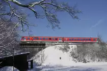 628 559 der Südostbayernbahn auf der Chiemgaubahn Prien - Aschau, kurz hinter der Abzweigung von der Hauptstrecke Rosenheim - Salzburg (3.2.15).