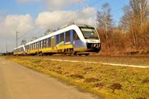 Eine Doppeleinheit RE10 nach Düsseldorf geführt vom 648 440 der NWB am Sonntag den 22.2.2015 in Richtung Neuss Vogelsang fahrend. 