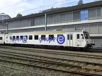 tpf - Werbesteuerwagen 1+2 Kl. ABt 50 36 35-33 383-7 im Bahnhof Freiburg am 14.02.2015