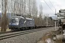 1116 126 (Licht ins Dunkel II) mit Güterzug bei Niklasdorf am 23.02.2015.