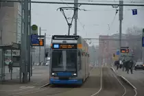 Niederflurstraßenbahn  1154  auf der Linie 12 nach Gohlis-Nord. Aufgenommen am 18.02.2015, Leipzig Augustusplatz.
