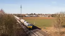 Der 52743, ein gemischter Güterzug von München-Nord nach Mühldorf, bespannt mit 247 051-6 - hier mit Ortsblick auf Heimstetten - wurde am 8. März 2015 abgelichtet.