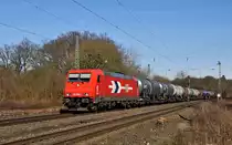 Alpha Trains Belgium 185 606, vermietet an RheinCargo (bis Aug. 2012 an HGK (2064)), zieht einen Kesselwagenzug am 08.03.15 durch den ehemaligen Bahnhof Vehrte in Richtung Osnabr�ck.