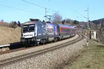 Die 1116 222 mit einem Korridorzug von Salzburg nach Kufstein bei Bergen (Obb) am 07.03.2015