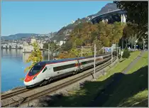 Ein SBB ETR 610 auf dem Weg von Milano nach Genève beim Château de Chillon. 
1. Nov. 2014