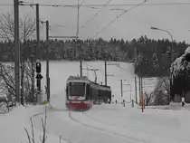 Auf der Fahrt nach Trogen hat am 01.02.2015 Triebwagen Nr. 33 'Speicher' gerade die Station 'Schwarzer Bären' verlassen.