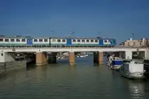 Ein FS TRENITALIA ALe 642 als TI 6471 Ravenna - Rimini auf der Brücke über den Fiume Uso in Bellaria an der Adria; 15.04.2015
