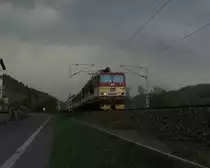 Eurocity nach Prag wenige Sekunden vor dem Gewitter am 27.04.2015 in Krippen. Zuglok die 371 005.
