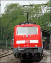 Die 111 147-5 im Regional Verkehr Einsatz.Hier zu sehen mit dem NRW Express (RE1) am Bahnsteig von Eschweiler im Mai 2015.