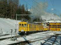 Berninatriebwagen ABe 4/4 Nr.34 und 30(1908 u.1910)mit zwei AW am 17.02.07 in Pontresina