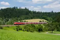 111 162 mit RE 19958 nach Stuttgart.Aufgenommen bei Mittelrot an der Murrbahn am 26.6.2015.