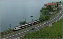 Etwas Gotthard im Lauvaux Ein TILO ETR 524 (bzw. RABe 524) im Regionalzugeinsatz auf der RER Vaud, hier bei Rivaz. 
27. Juni 2015