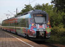 Werbehamster 442 354-7 als S1 von Rostock Hbf nach Warnem�nde bei der Ausfahrt im Haltepunkt Rostock-Holbeinplatz.24.07.2015