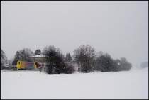 ER 20 - 005 durchf�hrt bei dichtem Schneetreiben, mit Alx 86712, den ehemaligen Bahnhof Schwabhausen (27.01.2007)