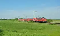 111 081-0 fuhr am 05.06.2015 mit einem RE von Emden nach Münster, hier bei Petkum.