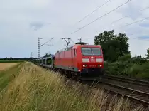 Bei Kaarst Broicher Seite ist hier die 185 192-2 mit einem leeren Autotransportwagenzug in Richtung Neuss unterwegs. 26.7.2015