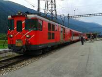 Deh 4/4 54 mit R 514 (Visp - Andermatt) am 23.7.2015 beim Halt in Oberwald.