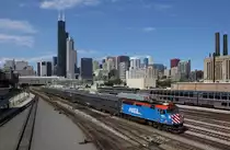 119 approaches Chicago Union station whilst pushing an inbound Metra train, 11 August 2015