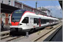RB 87688 nach Engen im Bahnhof Singen wird durch den Flirt 521 207 geführt. (02.08.2015)