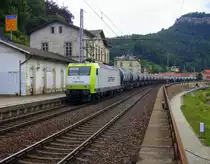 145 095-6 von Captrain kommt durch Königstein(Sächsische Schweiz) mit einem langen Kesselzug aus Dresden-Friedrichstadt-(Gbf) nach Bad-Schandau(D)
und fährt in Richtung Bad-Schandau(D),Krippen(D),Schöna(D),Decin(CZ). 
Aufgenommen vom Bahnhof von Königstein(Sächsische Schweiz). 
Bei Sommerwetter am Nachmittag vom 17.7.2015.