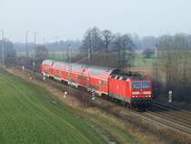 Aufgrund von h�ufigen Wildunf�llen, r�stete die DB Regio Nordost, einigen ihrer 143iger zus�tzliche Fernscheinwerfer nach. So auch 143 360, die gerade auf dem Weg nach W�nsdorf-Waldstadt, mit ihrem RE 7 ist. 24.02.2007