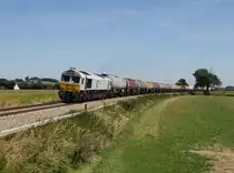 Die 247 045 mit einem Kesselzug am 28.08.2015 unterwegs bei Weidenbach.