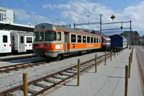 Es gibt sie noch; die Steuerwagen in den alten GFM Farben; Bt 256 abgestellt in Bulle, 08.09.2015.