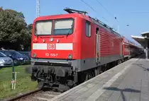 112 155-7 mit RE 18591 von Warnem�nde nach Berlin Hbf(tief)abgestellt am 12.09.2015 im Bahnhof Warnem�nde.