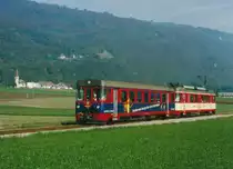 TRAVYS/YStC: Regionalzug auf der Fahrt von Yverdon-les-Bains nach Sainte-Croix bei Vuitebouef unterwegs mit Be 4/4 1 bis 3 (1981) und einem Bt im August 1995.
Foto: Walter Ruetsch
