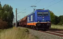 Mit einem Schwenkdachwagenzug fuhr 185 419 am 01.08.15 durch Greppin Richtung Bitterfeld.