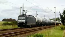 Am 23.09.2015 kam die 185 557-6 von der  MRCE dispolok aus der Richtung Stendal nach Demker und fuhr weiter in Richtung Magdeburg .