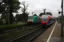 Ein Nachschuss von der Euregiobahn (RB20) und  kommt  aus Eschweiler-Sankt-Jöris nach Langerwehe und hilt in Kohlscheid und fährt in Richtung Richterich,Laurensberg,Aachen-West,
Bei Regenwetter am Abend vom 23.9.2015.