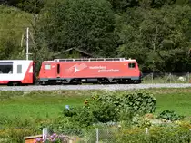 MGB - Schnappschuss der HGe 4/4 107 mit Glacier Express unterwegs in Fiesch am 06.09.2015