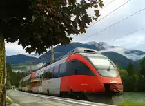 4024 124-2 als R 4260 (Lienz - Friesach) am 24.9.2015 bei der Abfahrt in Berg im Drautal.