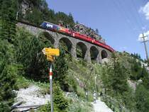RhB,Albulalinie Fr 6 km Luftlinie wurden 12,6
km Geleise verlegt.Am 1.Juli 1903 fuhr der erste 
Zug ins Engadin.(11.07.03)