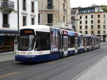 tpg - Tram Be 6/8 879 unterwegs in den Strassen von der Stadt Genf am 05.09.2015