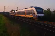 Nachschuß auf einen von der untergehenden Sonne angestrahlten RE10 nach Kleve bei Tilmeshof am heutigen Abend aufgenommen. 10.10.2015