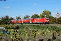 146 221 mit dem RE 19509 (Heidelberg-Stuttgart) bei Bruchsal-Schlachthof, 28.09.2015.