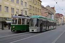 TW 234trifft während einer Fotosonderfahrt in der Annenstraße auf Cityrunner 654, 18.10.2015