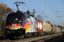 25 Jahre Wiedervereinigung. Wir sind ein Volk als Puzzle Deutschland Fahne auf der ES64 U2 - 060 zu sehen am 31.10.2015 bei Eglharting Richtung München.