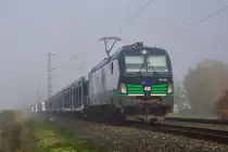 193 230 von Rurtalbahn Cargo mit einen leeren Autozug bei Thüngersheim am 27.10.15