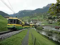 WAB Gelenk-TW 142 (BHe 4/8) Pano, Grindelwald einfahrend aus Richtung  Kleine Scheidegg  am 4.10.2013