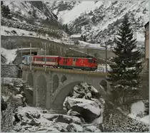 Ein MGB Regionalzug erreicht, von Andermatt kommend, Göschenen. 
24. Jan. 2014 