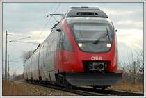 4024 086 als RSB 9 von Wien S�d �ber Wien Floridsdorf nach Wiener Neustadt unterwegs am 4.3.2007 kurz vor der Einfahrt in Wien Breitenleer Stra�e.