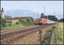 1116 208 bringt im Sommer 2005 den EuroCity84  Michelangelo  vom Brenner nach M�nchen. Aufgenommen beim Kloster Raisach.