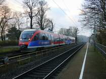 Zwei Euregiobahn (RB20) kommen aus Langerwehe-Stolberg-Altstadt nach Heerlen(NL) aus Richtung Aachen-West,Laurensberg,Richterich und hielten in Kohlscheid und fahren in Richtung Herzogenrath. 
Bei Sonne und Wolken am Kalten Morgen vom 26.11.2015.