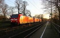 146 026 kommt mit zwei 146er alle drei von DB aus Aachen-Hbf nach Dortmund-Hbf und kommen aus Richtung Aachen-Hbf,Aachen-Schanz,Aachen-West,Laurensberg,Richterich, und fahren durch Kohlscheid in Richtung Herzogenrath,Hofstadt,Finkenrath,Rimburg,Übach-Palenberg,Zweibrüggen,Frelenberg,Geilenkirchen,Süggerrath,Lindern,Brachelen,Hückelhoven-Baal,Baal,Erkelenz,Herrath,Beckrath,Wickrath,Rheydt,Mönchengladbach.
In der Abendstimmung am Abend vom Kalten 26.11.2015.