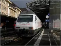 Die SBB Re 460 098-7-  Biasca  wirbt für den Gotthardtunnel. 
Lausanne, den  4. Jan. 2015  